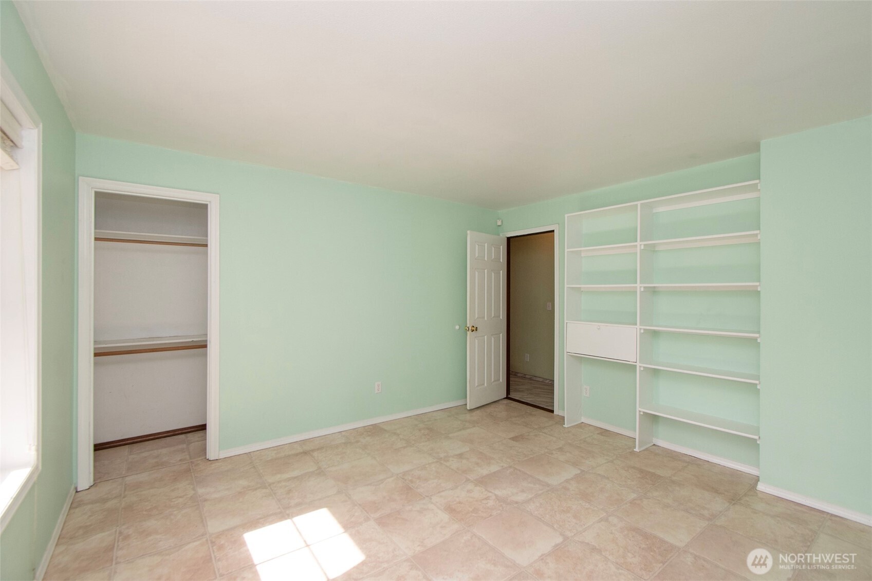 153 Spencer Road Sequim, WA 98382 - Photo 16 of 36 a view of an empty room with closet and utility room