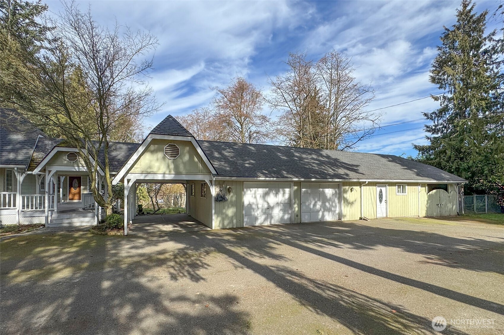 153 Spencer Road Sequim, WA 98382 - Photo 31 of 36 a front view of a house with a yard