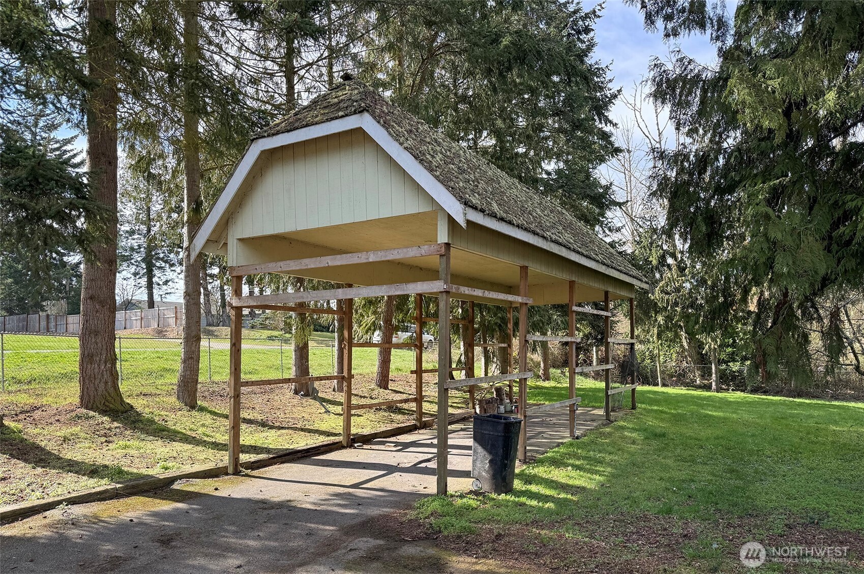 153 Spencer Road Sequim, WA 98382 - Photo 7 of 36 a view of a house with a yard