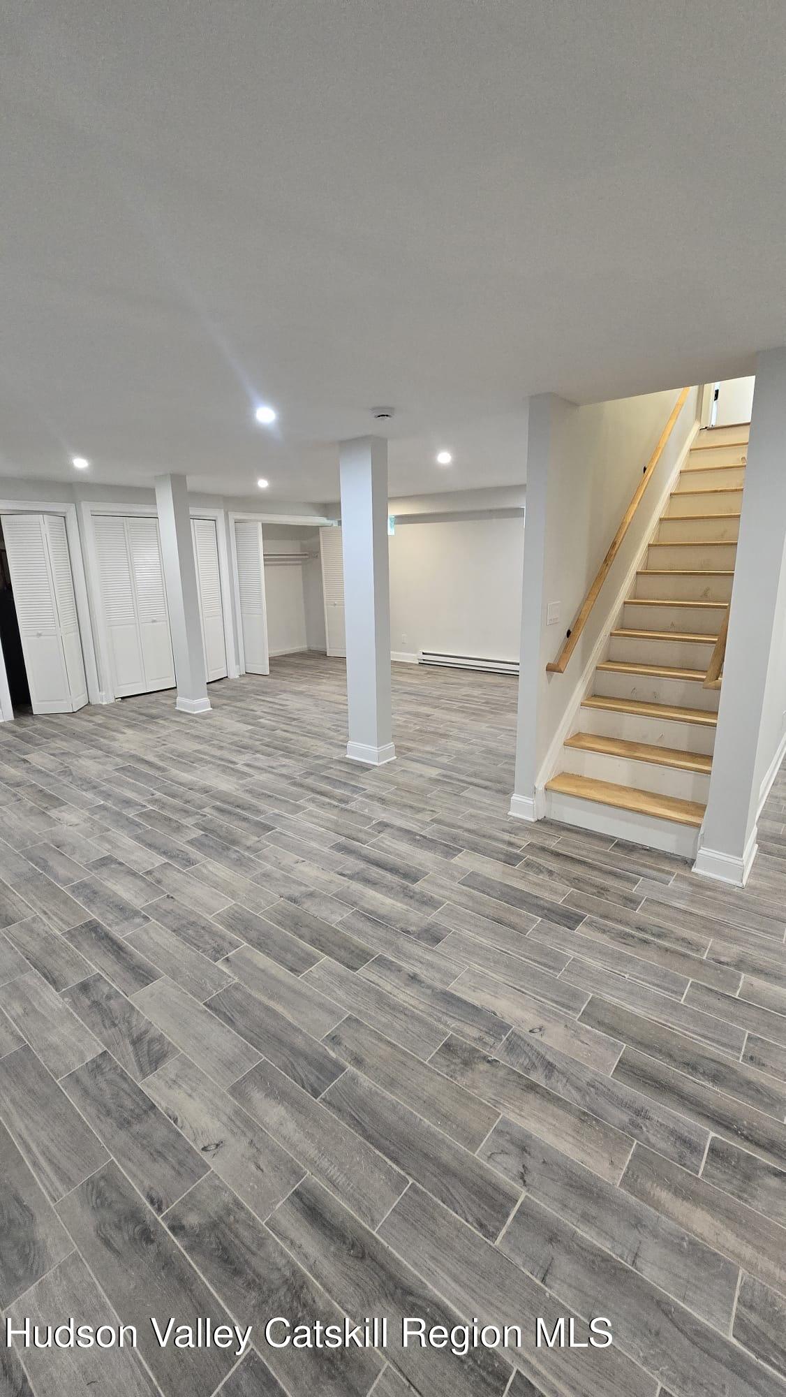 1321 Sleepy Hollow Road Athens, NY 12015 - Photo 6 of 10 a view of an empty room with wooden floor