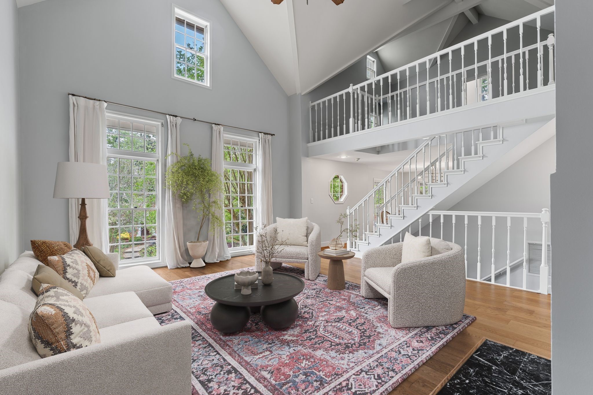 1601 Haver Street Houston, TX 77006 - Photo 10 of 22 Large windows line the walls, bathing the space in natural light and offering enchanting views of the surrounding trees.