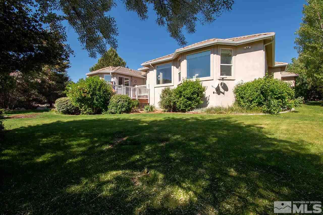 12640 Fieldcreek Lane Reno, NV 89511 - Photo 8 of 37 a front view of a house with a yard