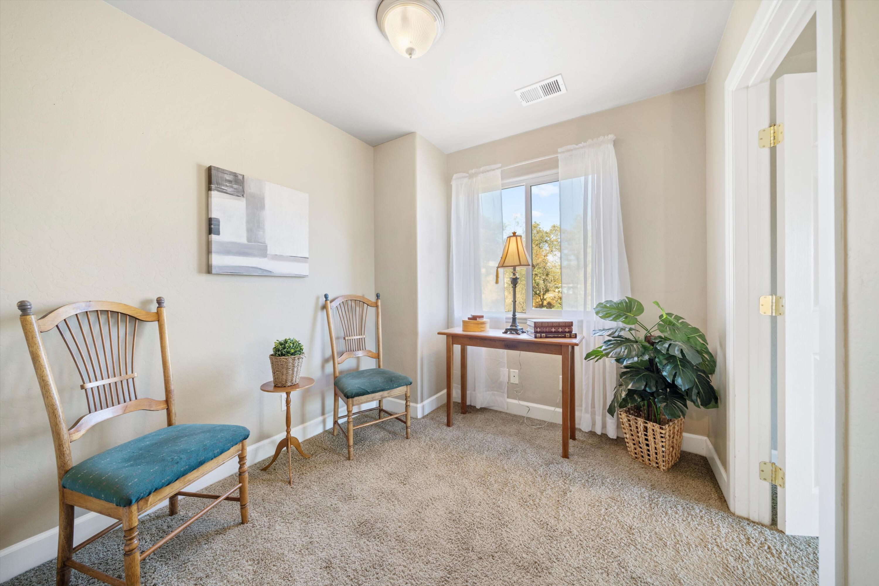 21605 Quail Springs Road Tehachapi, CA 93561 - Photo 17 of 35 a living room with furniture and a window