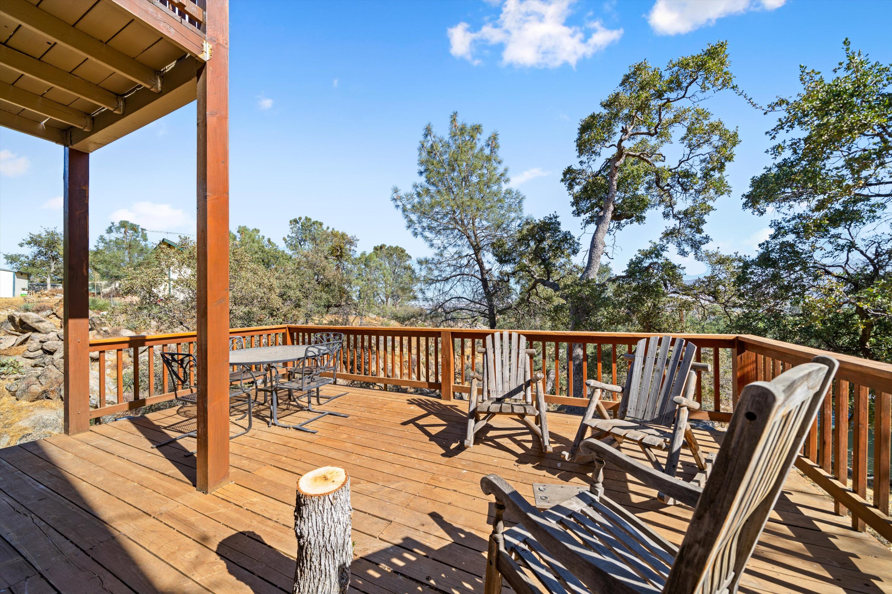 21605 Quail Springs Road Tehachapi, CA 93561 - Photo 21 of 35 a view of balcony with wooden floor and seating space