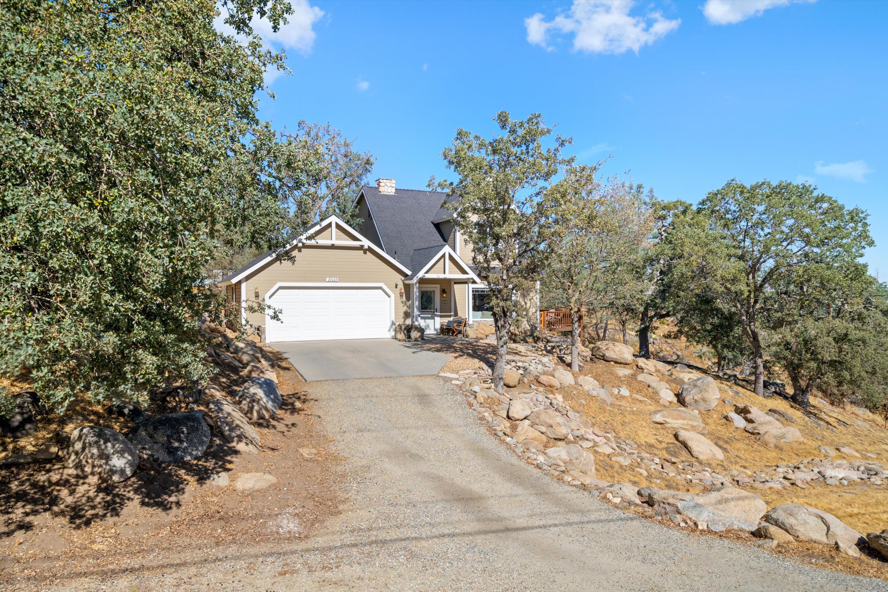 21605 Quail Springs Road Tehachapi, CA 93561 - Photo 27 of 35 a view of a house with a snow in the background
