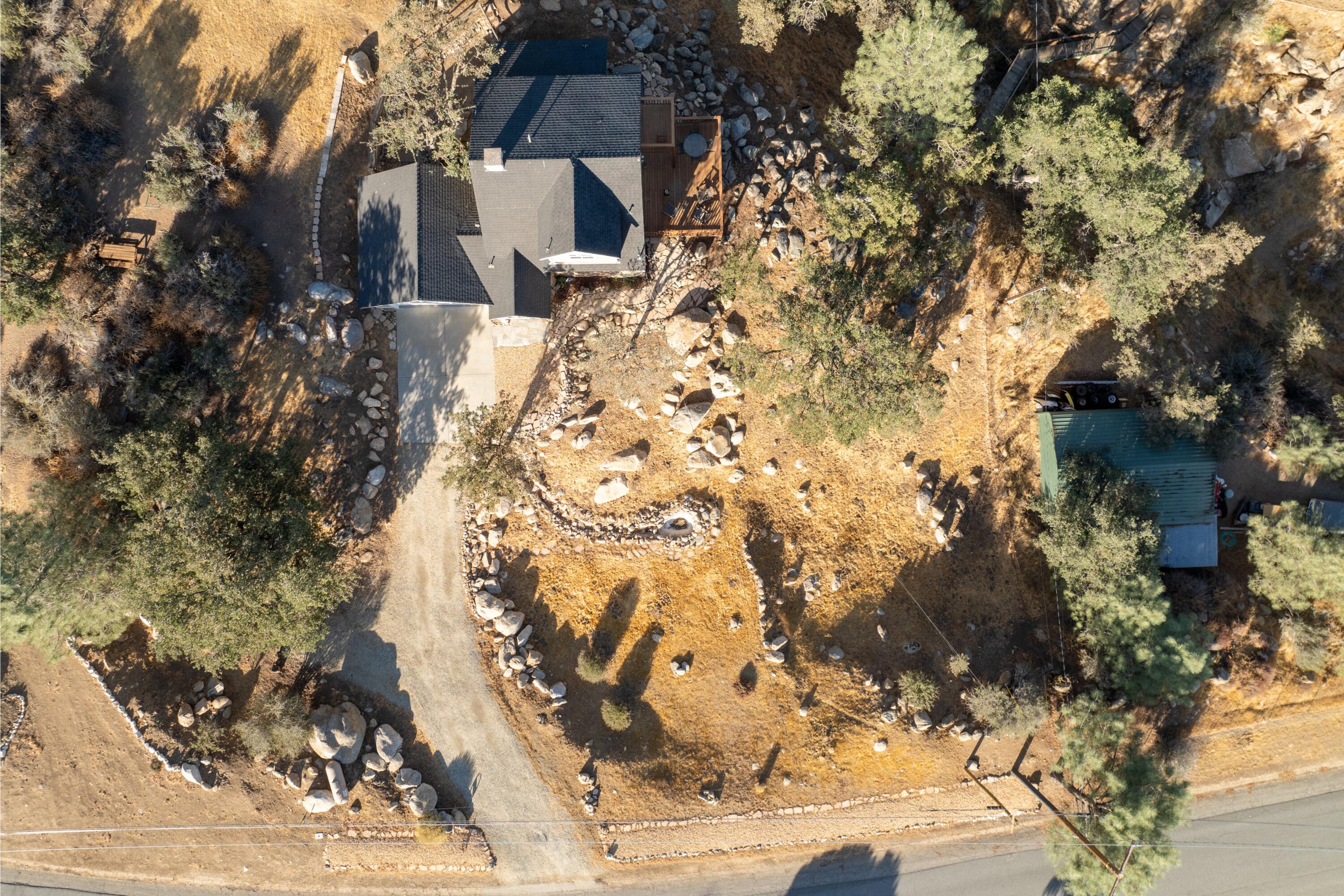 21605 Quail Springs Road Tehachapi, CA 93561 - Photo 30 of 35 front view of a house with a yard