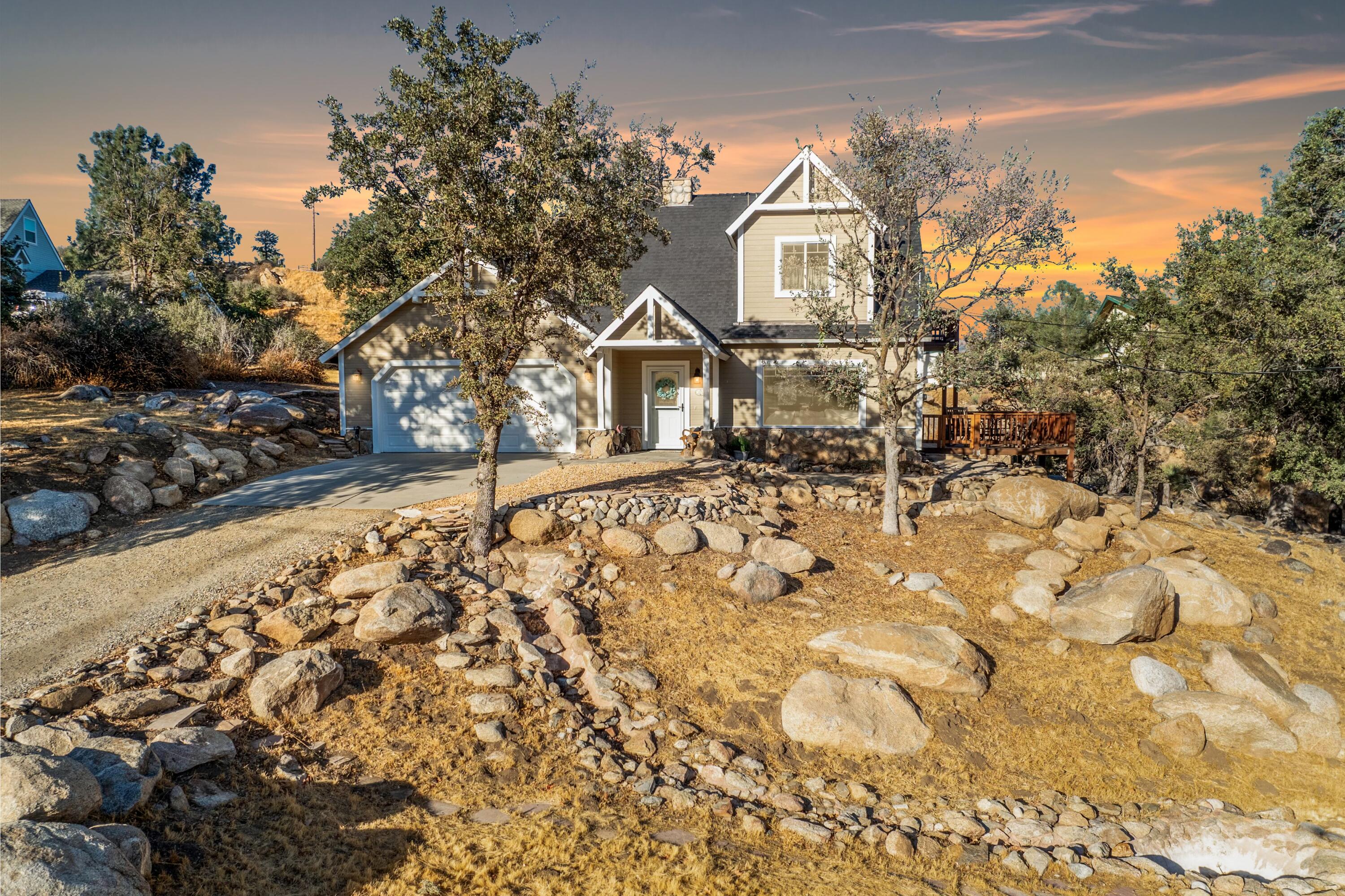 21605 Quail Springs Road Tehachapi, CA 93561 - Photo 35 of 35 a view of a large house with a yard