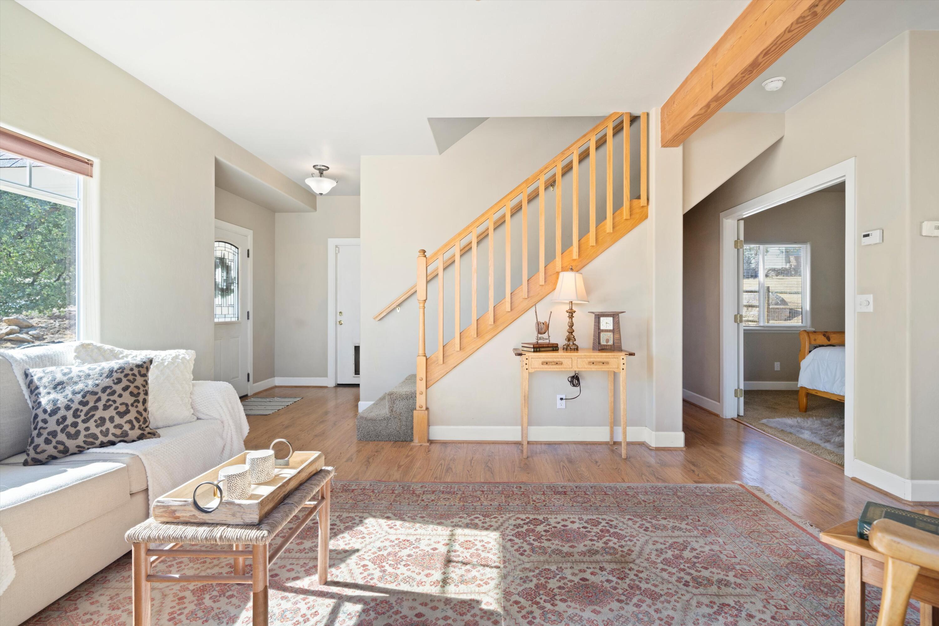21605 Quail Springs Road Tehachapi, CA 93561 - Photo 4 of 35 a view of entryway and hall with wooden floor