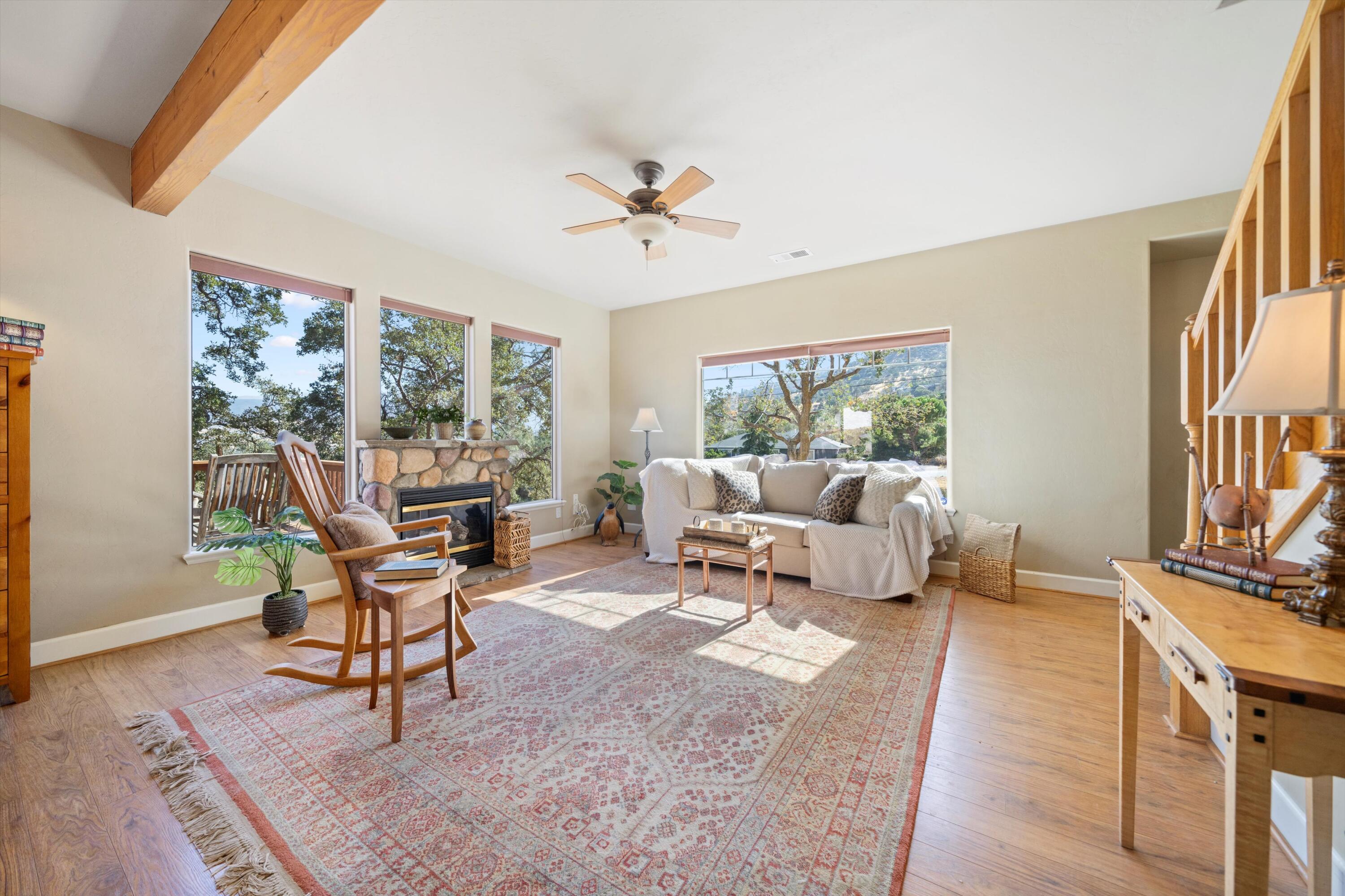 21605 Quail Springs Road Tehachapi, CA 93561 - Photo 6 of 35 a living room with furniture and a large window
