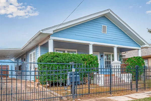 a house view with a garden space