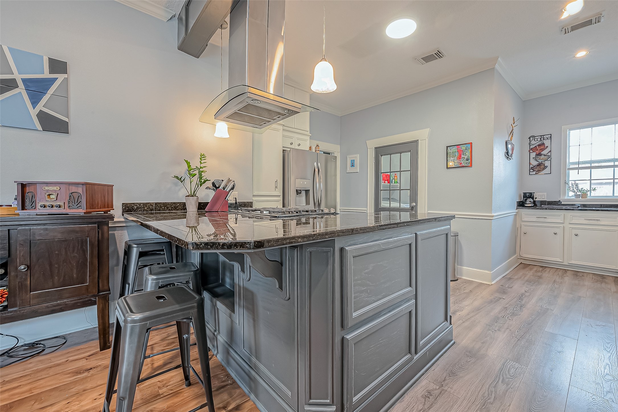 118 Jenkins Street Houston, TX 77003 - Photo 8 of 28 a kitchen with a sink cabinets and wooden floor