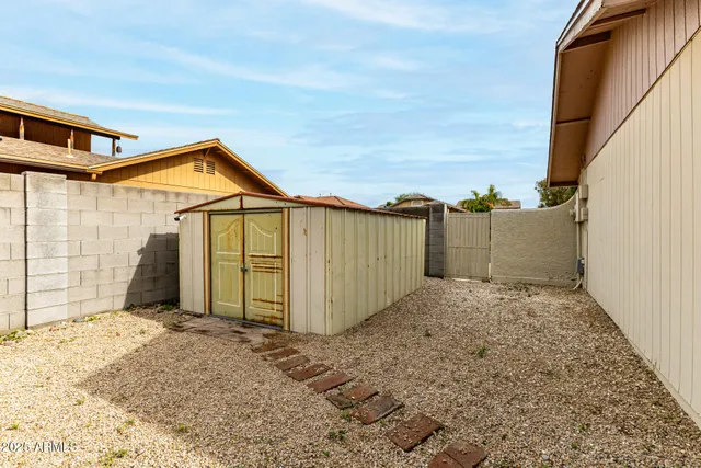 a view of a swimming pool with a lake view