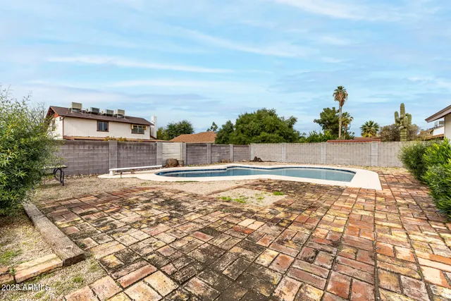 a view of a house with a swimming pool