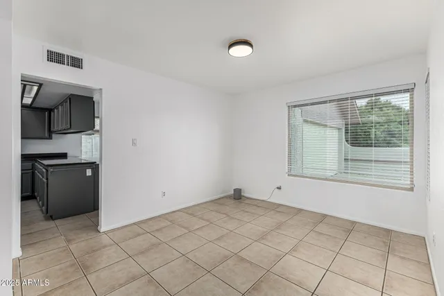 a view of an empty room and window