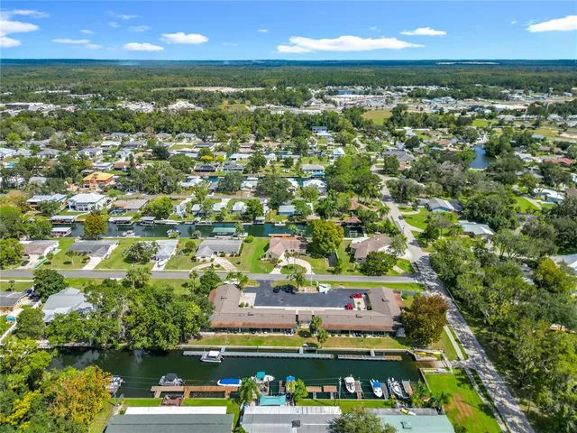 a view of a park with houses