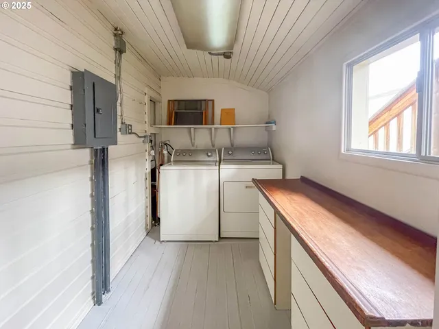 a utility room with dryer and washer