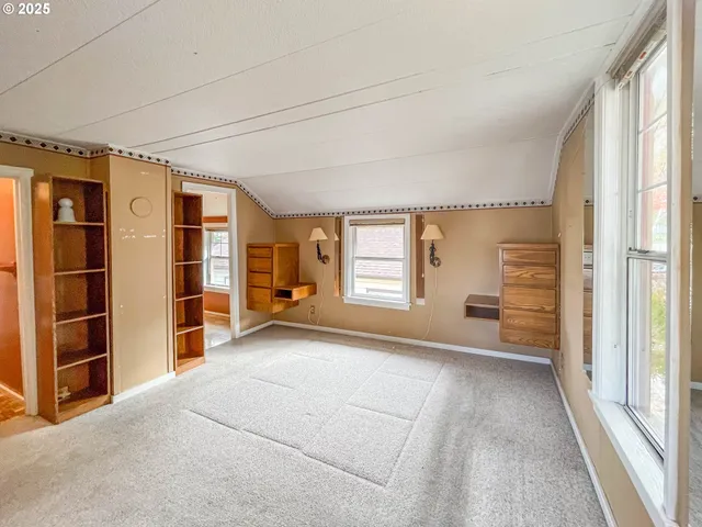 a bathroom with a toilet sink and shower