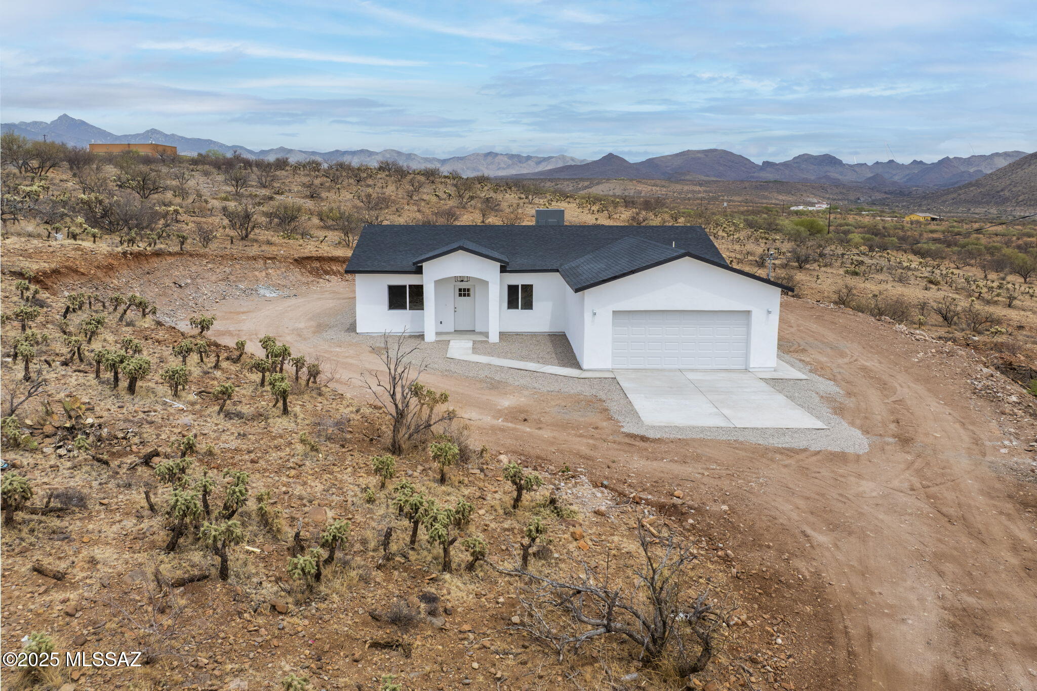 1895 Roma Court Rio Rico, AZ 85648 - Photo 38 of 42 a view of a house with a yard