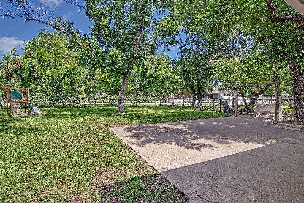 9801 Bellechase Road Granbury, TX 76049 - Photo 10 of 40 a view of a park with tree s