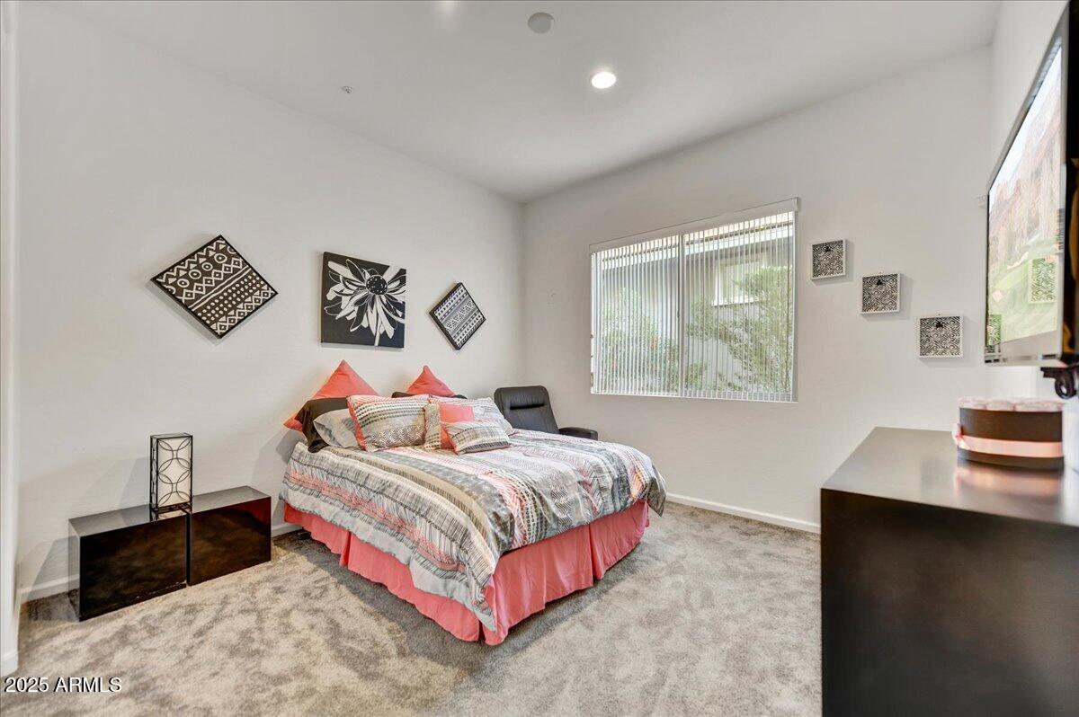 17943 East Silver Sage Lane Rio Verde, AZ 85263 - Photo 20 of 66 a bedroom with a bed and a desk