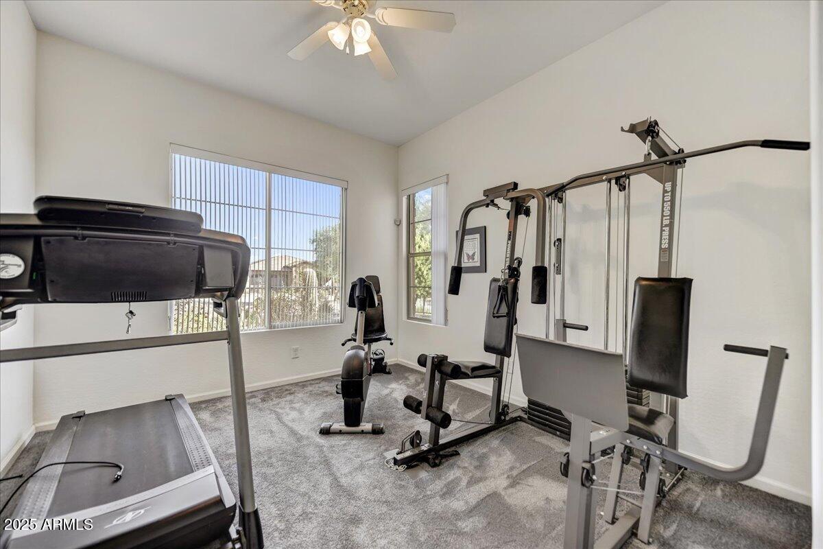 17943 East Silver Sage Lane Rio Verde, AZ 85263 - Photo 22 of 66 a view of a workspace with furniture and a window