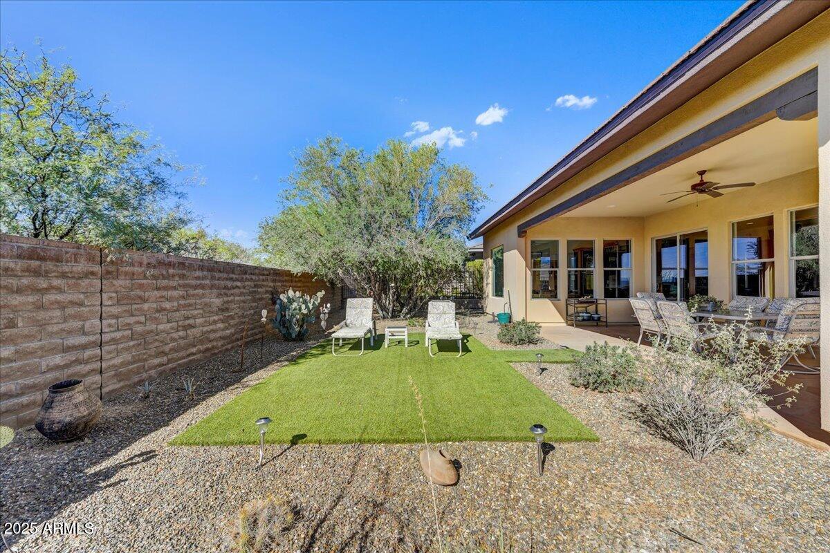 17943 East Silver Sage Lane Rio Verde, AZ 85263 - Photo 28 of 66 a view of a house with backyard and sitting area