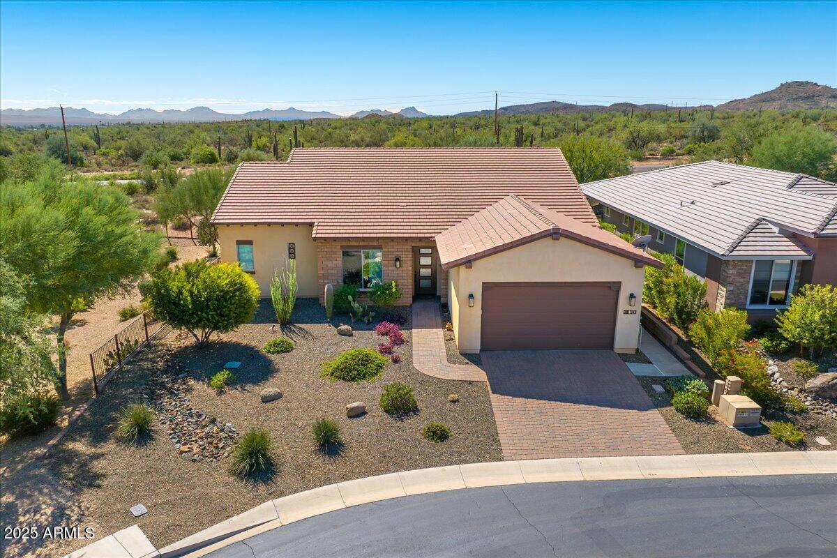 17943 East Silver Sage Lane Rio Verde, AZ 85263 - Photo 31 of 66 an aerial view of a house with garden space and a patio