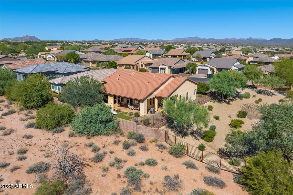 17943 East Silver Sage Lane Rio Verde, AZ 85263 - Photo 34 of 66 an aerial view of residential houses with outdoor space