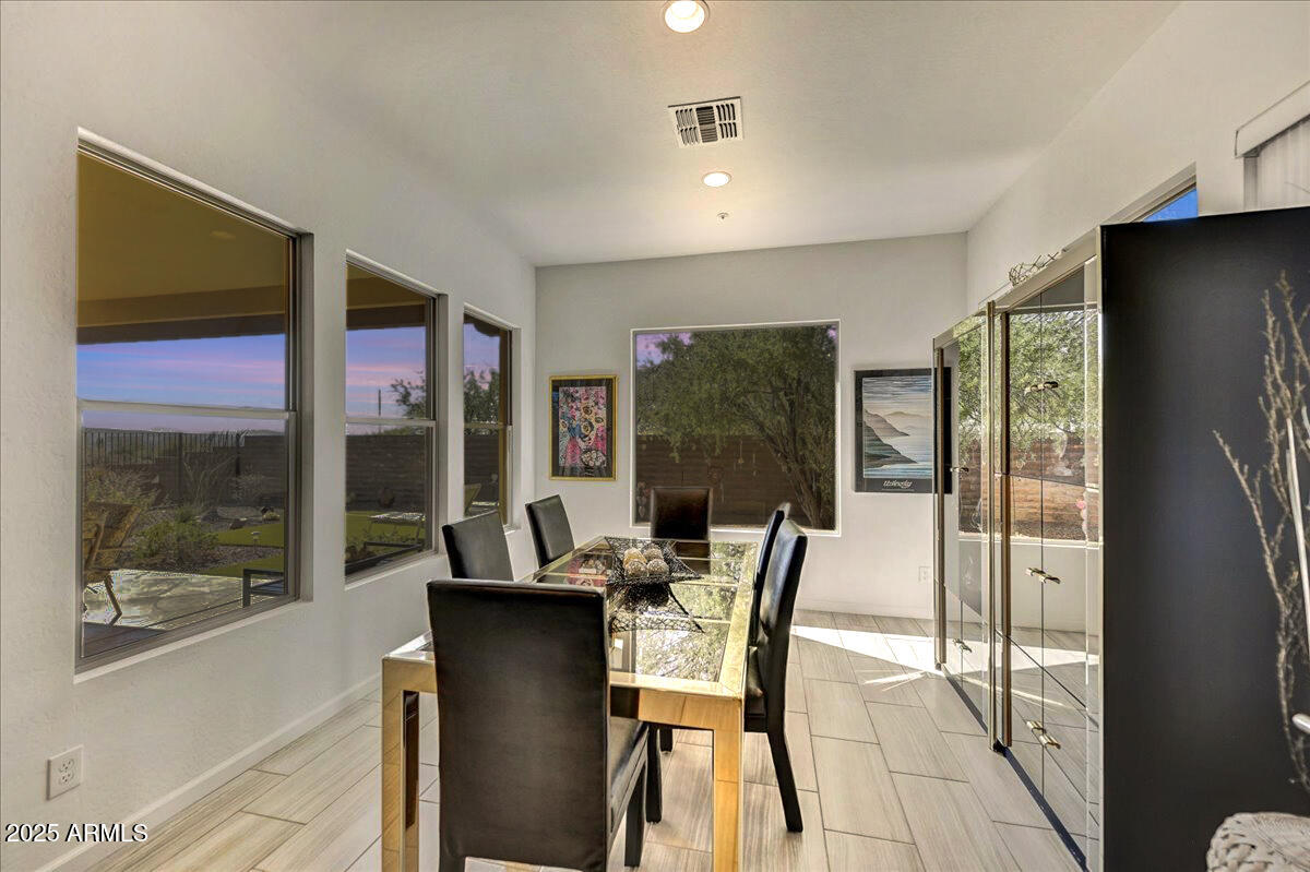 17943 East Silver Sage Lane Rio Verde, AZ 85263 - Photo 6 of 66 a view of a dining room with furniture window and outside view