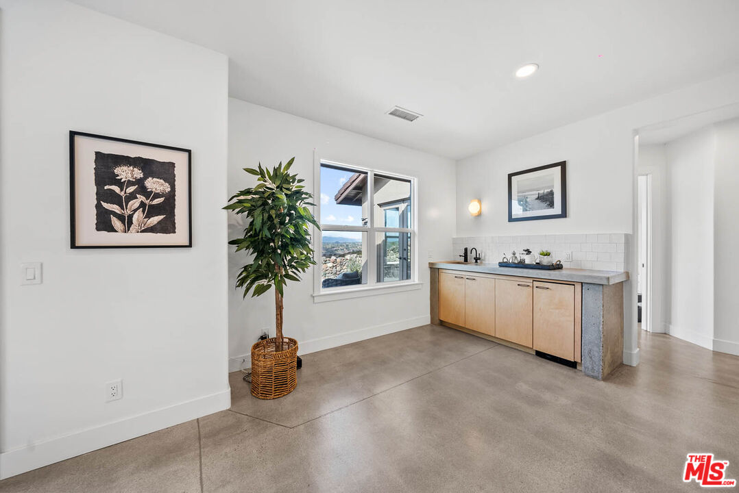 32070 Vía Vera Bonsall, CA 92003 - Photo 19 of 75 a living room with furniture and potted plant