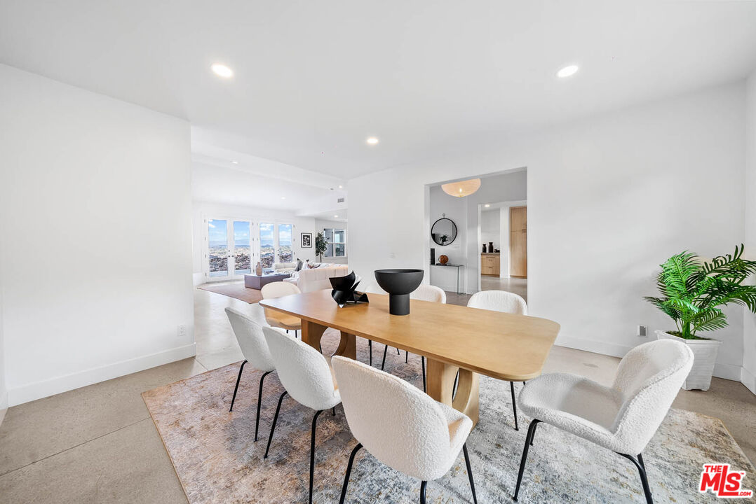 32070 Vía Vera Bonsall, CA 92003 - Photo 23 of 75 a view of a dining room with furniture