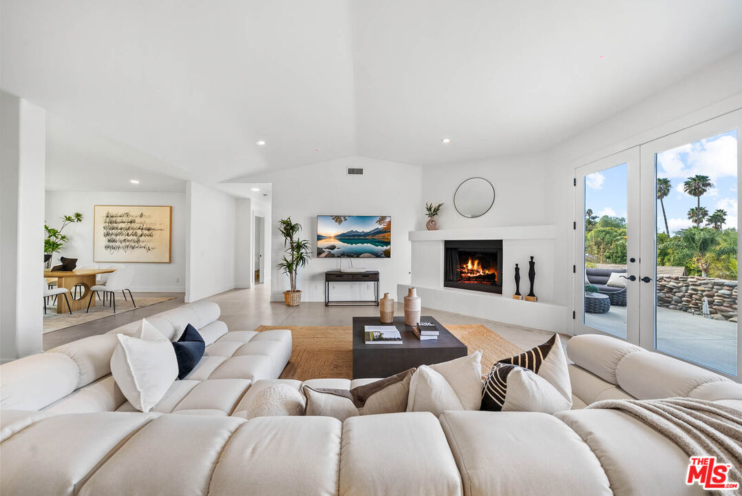 32070 Vía Vera Bonsall, CA 92003 - Photo 29 of 75 a living room with furniture fireplace and window