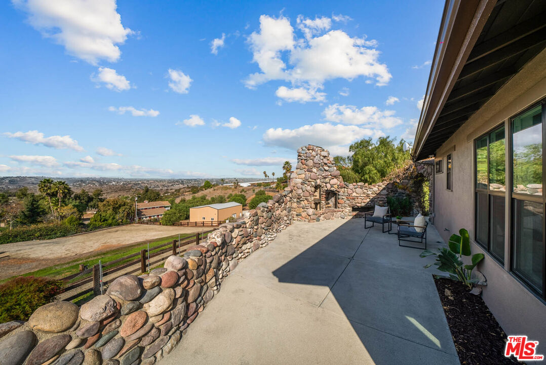 32070 Vía Vera Bonsall, CA 92003 - Photo 63 of 75 a view of a city street from a balcony