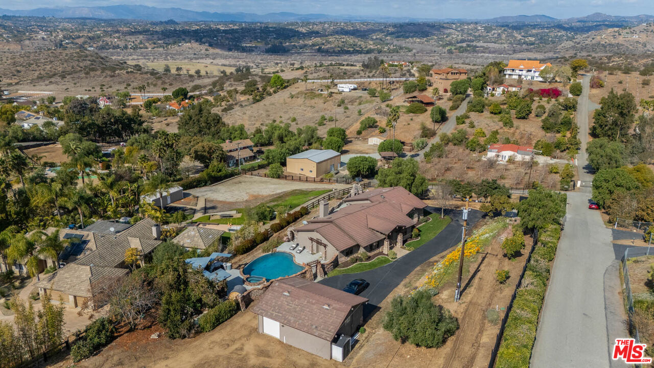 32070 Vía Vera Bonsall, CA 92003 - Photo 70 of 75 an aerial view of a city
