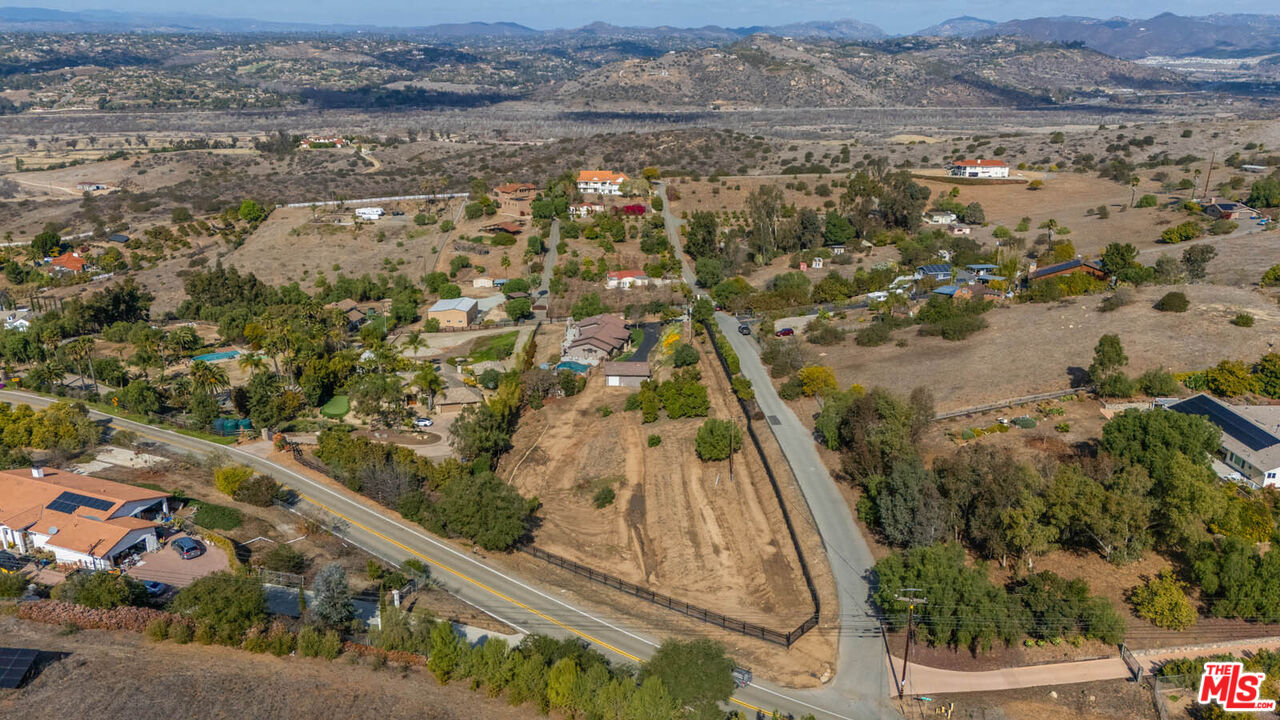 32070 Vía Vera Bonsall, CA 92003 - Photo 71 of 75 an aerial view of residential houses with outdoor space