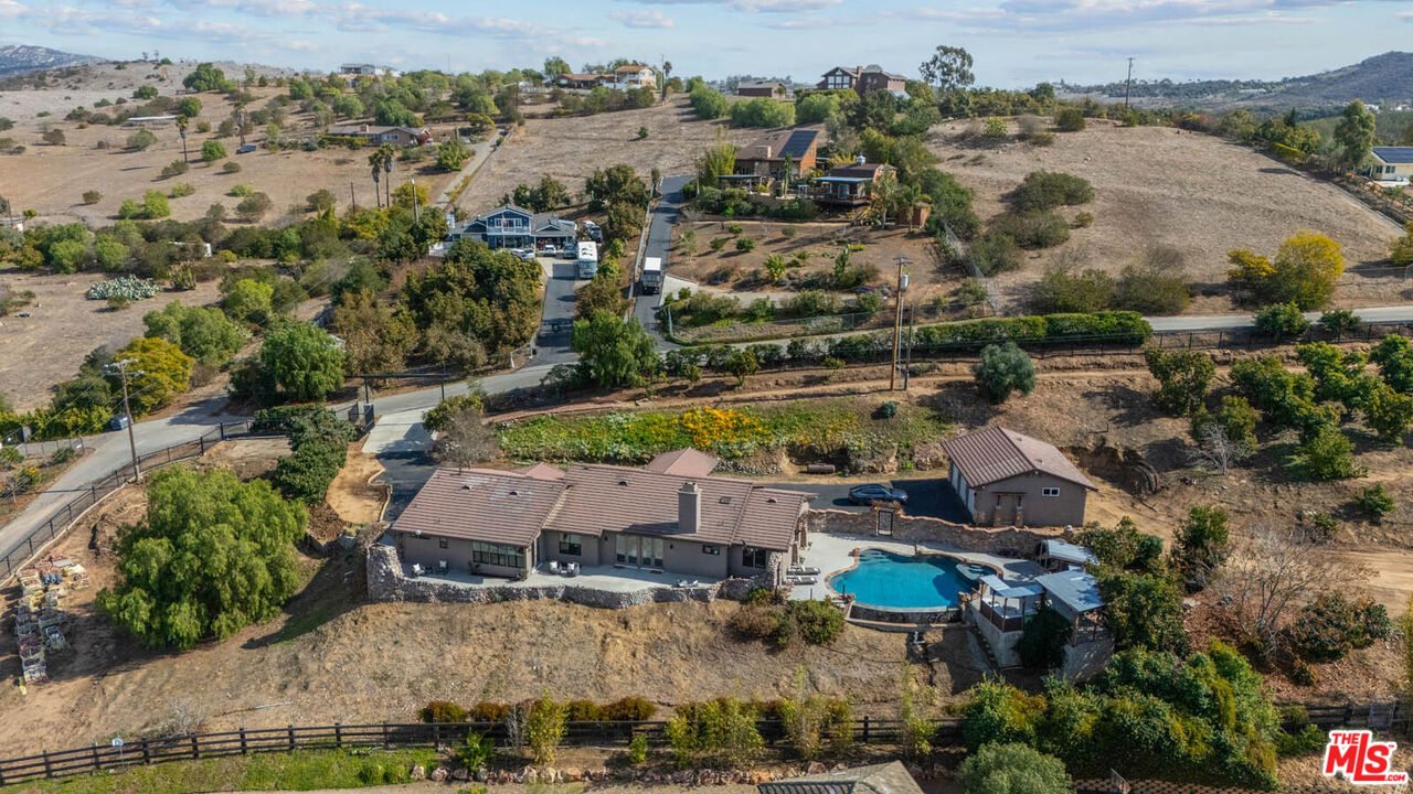 32070 Vía Vera Bonsall, CA 92003 - Photo 72 of 75 an aerial view of house with yard swimming pool and outdoor seating
