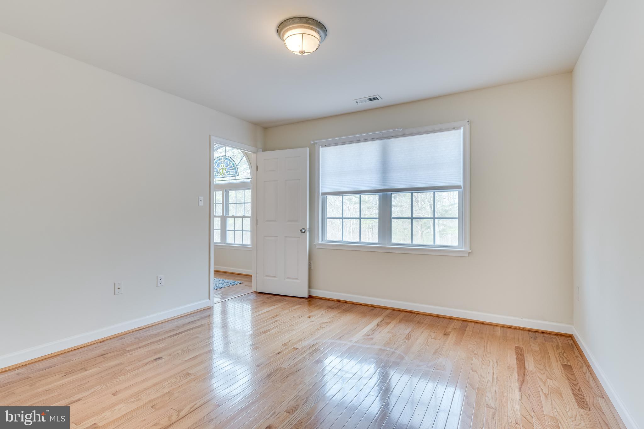2439 Chestnut Grove Road Sharpsburg, MD 21782 - Photo 21 of 51 Light , bright Bedroom # 3 w hardwood floors
