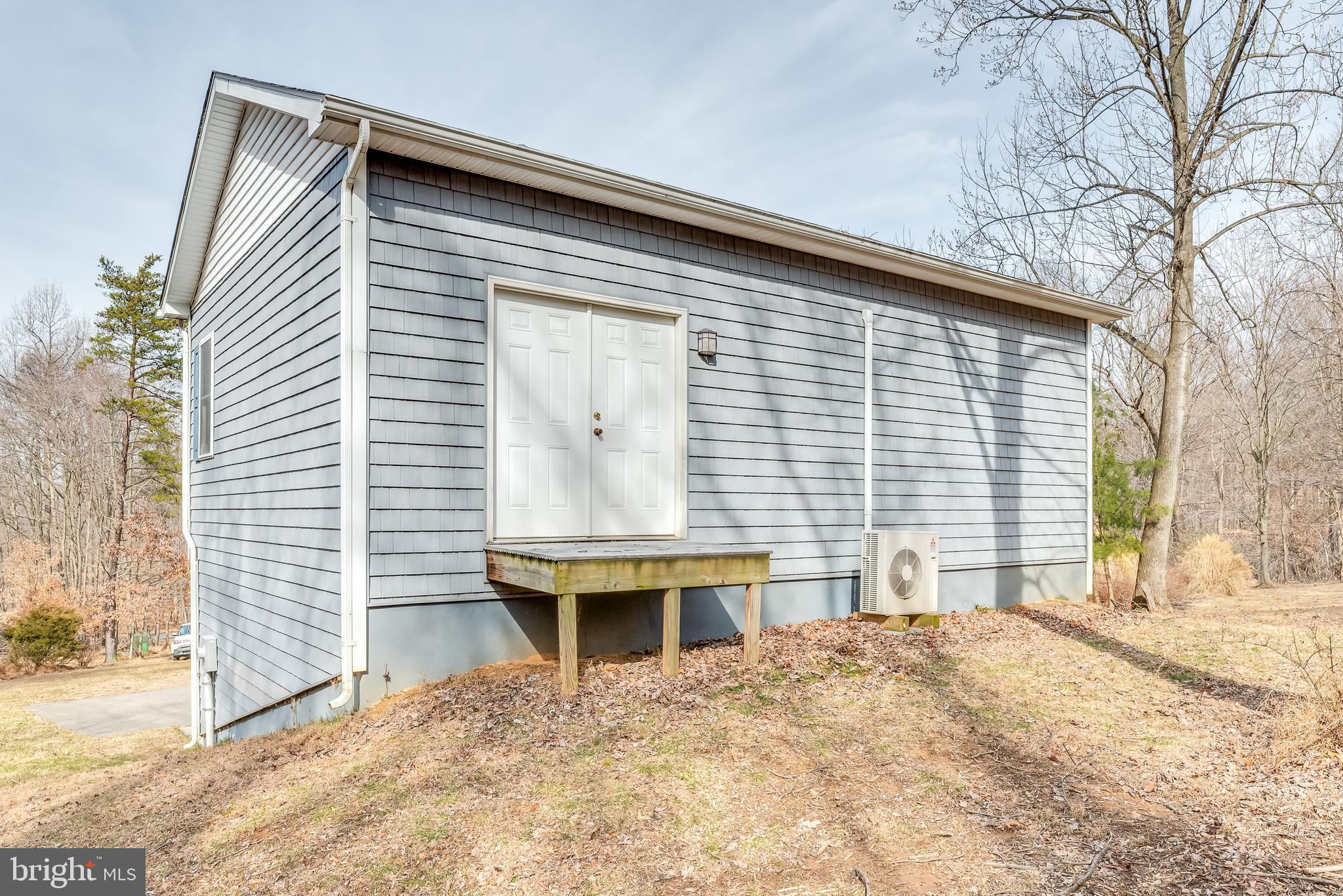 2439 Chestnut Grove Road Sharpsburg, MD 21782 - Photo 35 of 51 Rear loading dock on det. gar. w 2nd story shop