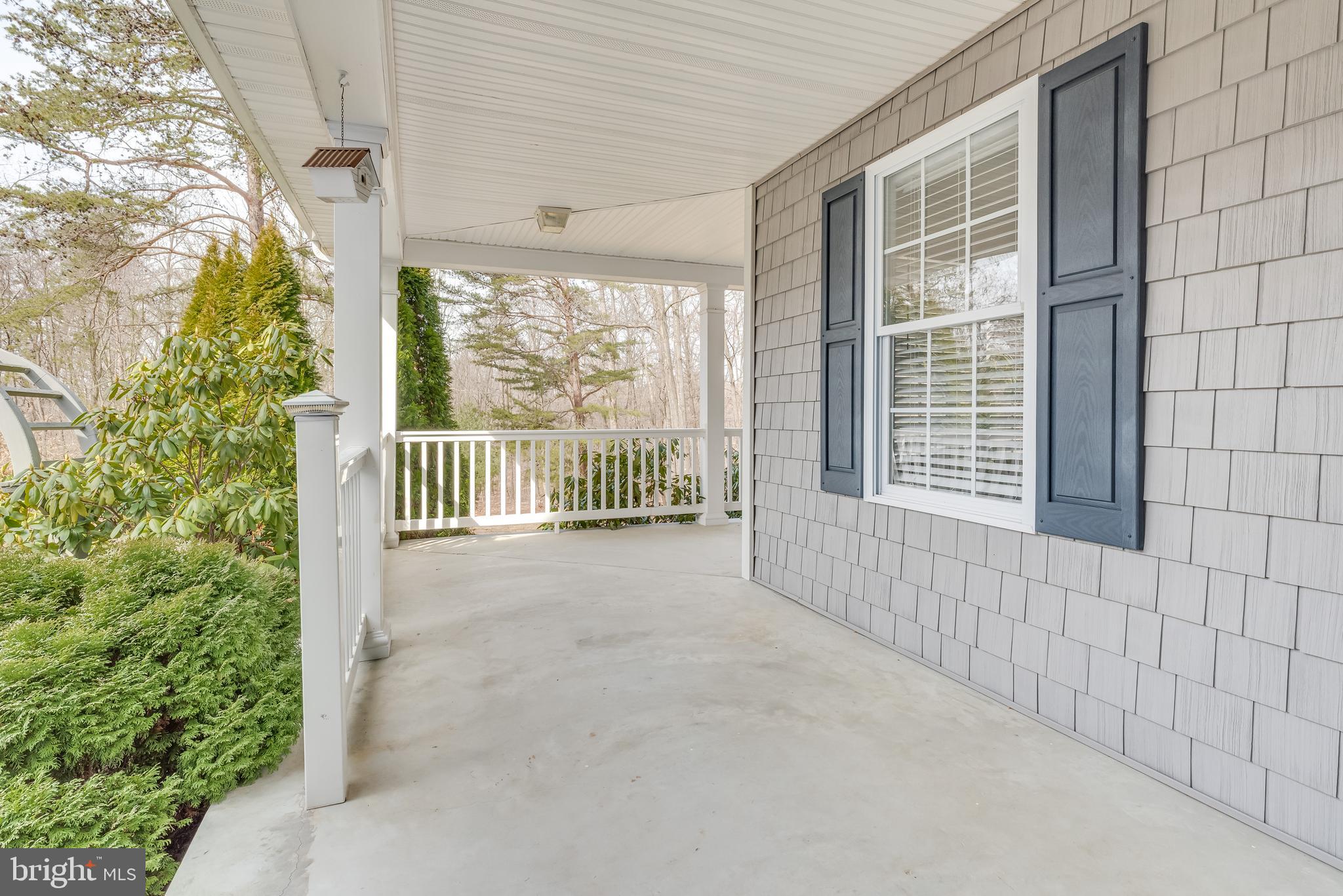2439 Chestnut Grove Road Sharpsburg, MD 21782 - Photo 39 of 51 Spacious wrap around front porch by Liv Rm window