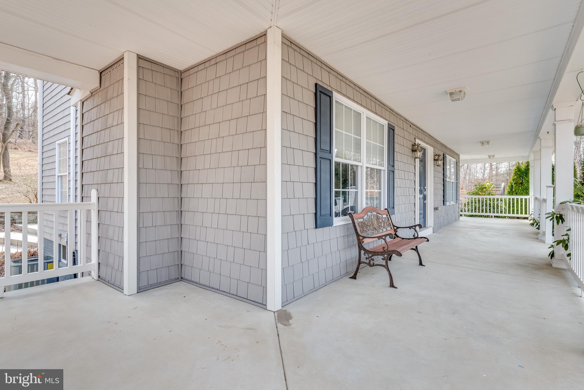 2439 Chestnut Grove Road Sharpsburg, MD 21782 - Photo 41 of 51 Wide, wrap around porch w 8" concrete floors