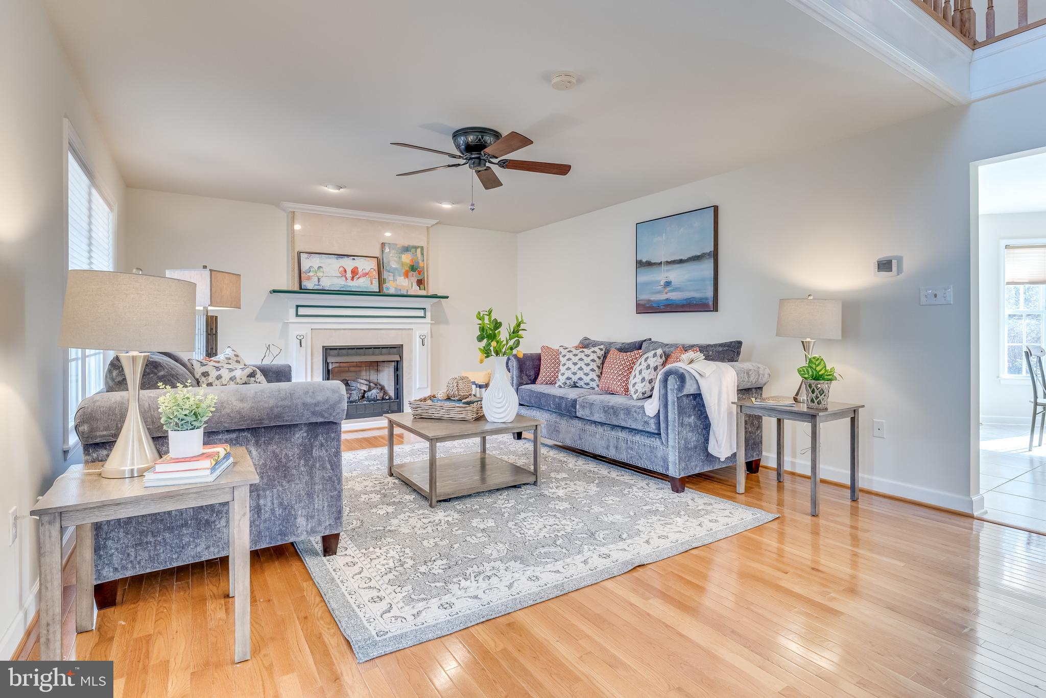 2439 Chestnut Grove Road Sharpsburg, MD 21782 - Photo 8 of 51 Light filled cozy living room w gas fireplace