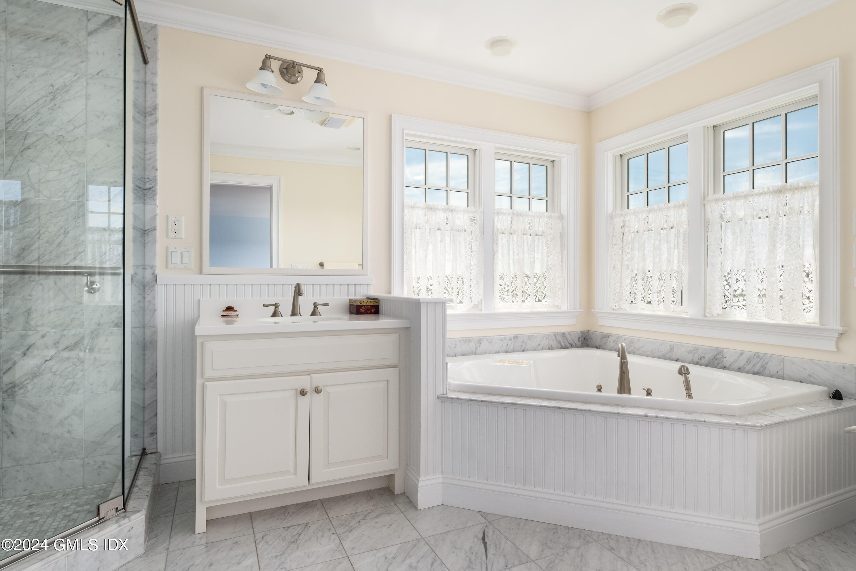 54 Valley Road, Unit B Cos Cob, CT 06807 - Photo 12 of 22 a bathroom with a bathtub and a sink