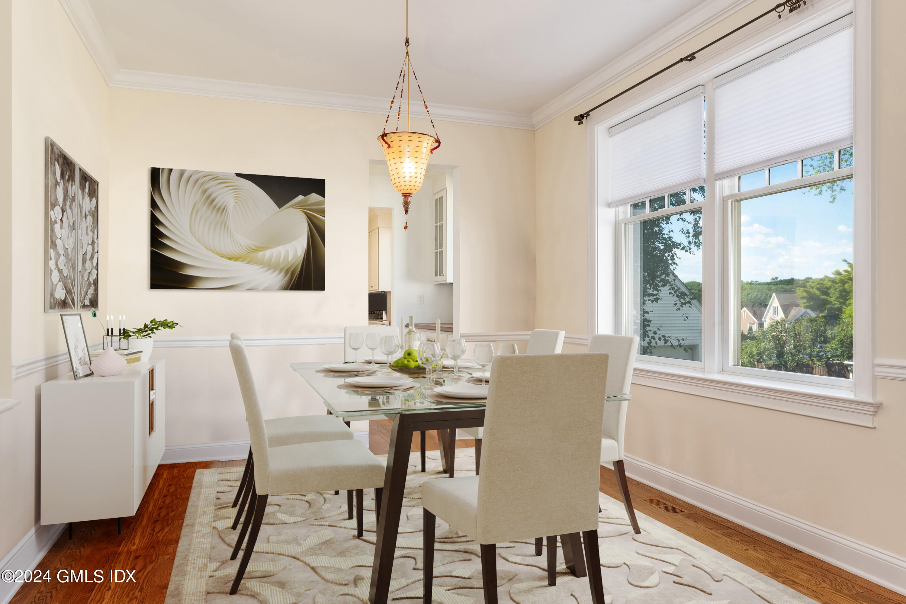 54 Valley Road, Unit B Cos Cob, CT 06807 - Photo 6 of 22 a view of a dining room with furniture window and wooden floor