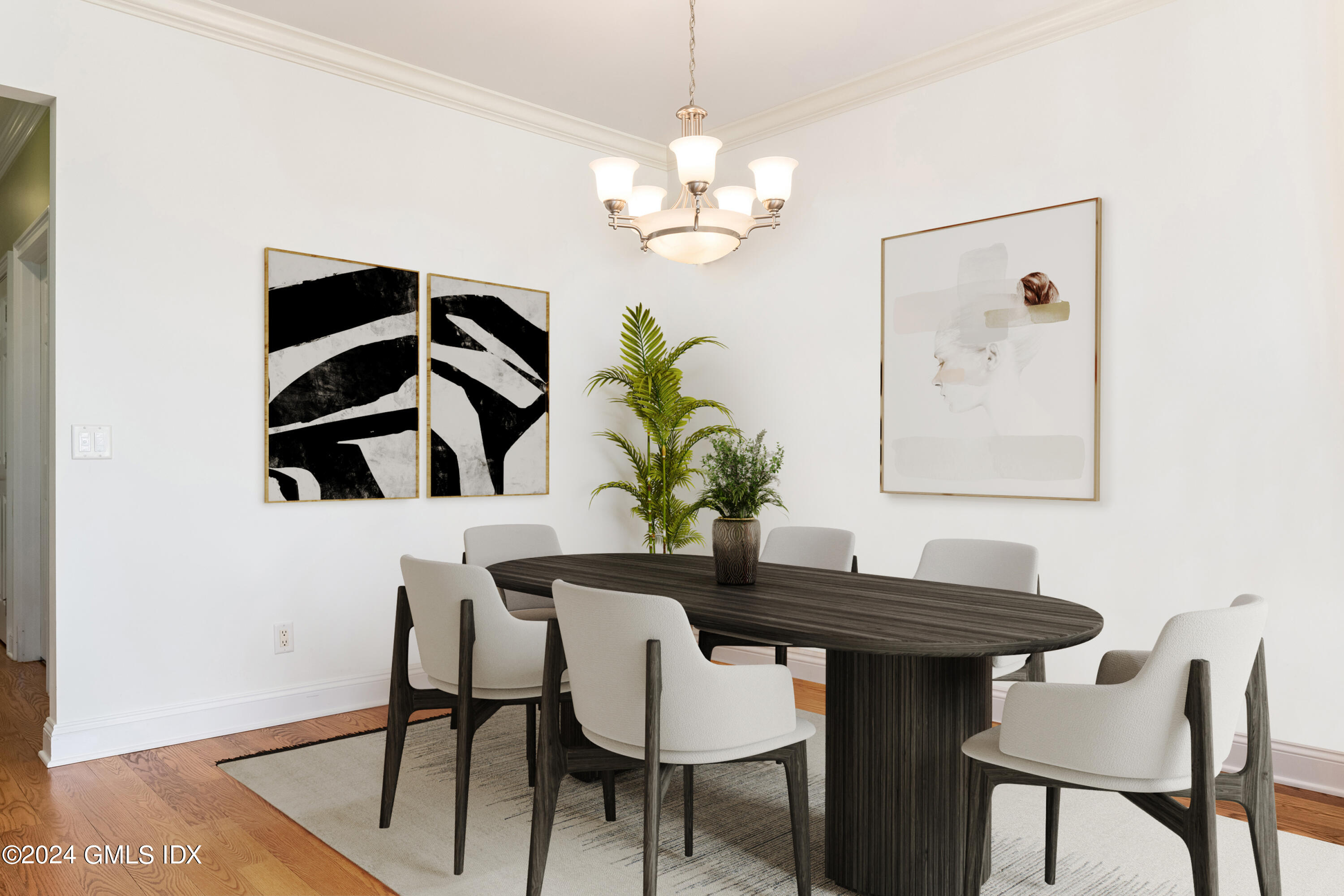 54 Valley Road, Unit B Cos Cob, CT 06807 - Photo 9 of 22 a view of a dining room with furniture and chandelier