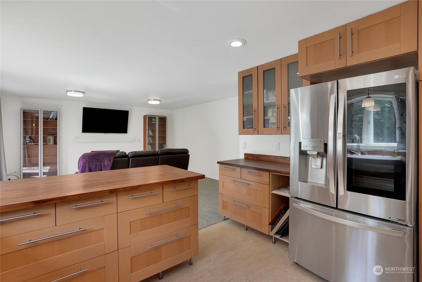 8110 Skinner Road Granite Falls, WA 98252 - Photo 7 of 30 a kitchen with stainless steel appliances white cabinets and a refrigerator