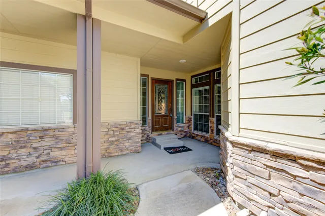 a backyard of a house with seating space