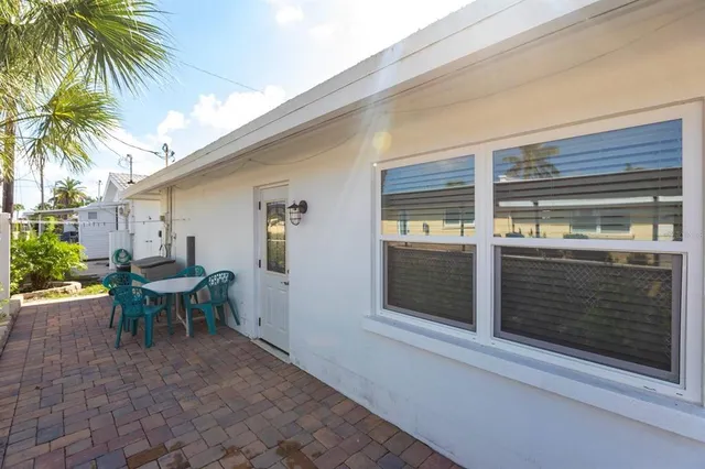 a view of a house with a patio
