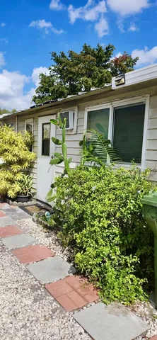 a view of a workspace with furniture