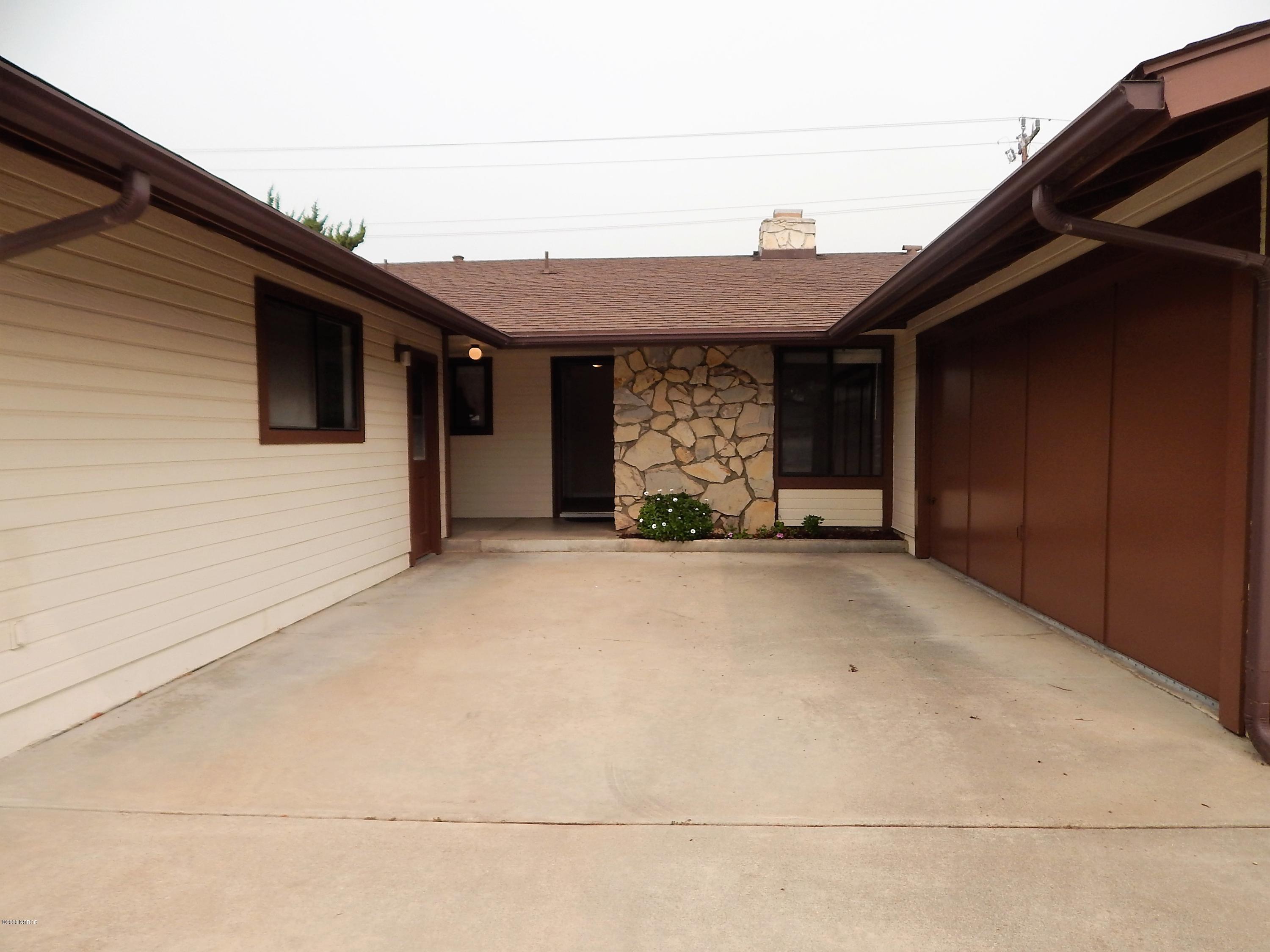 3951 Constellation Road Lompoc, CA 93436 - Photo 4 of 37 a view of a house with a garage