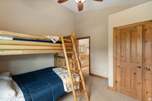 755 South Zion Ridge Drive Orderville, UT 84758 - Photo 56 of 84 Bedroom featuring light carpet and a ceiling fan